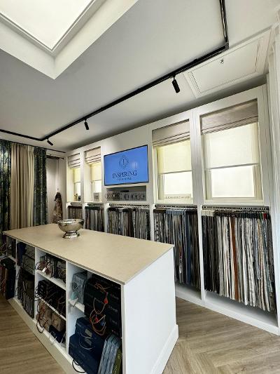 North London Curtain Fabric shop, inside view showing Fabric books and hangers