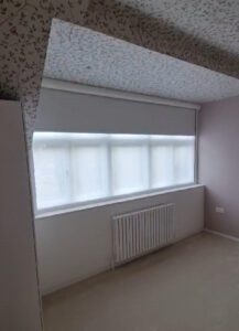 A very wide Fully Cassetted Total Blackout Roller Blind fitted together with a Sheer Privacy Blind in Central London