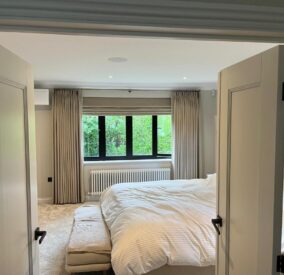Interlined Curtains and Electric Roman Blind in our Brushed Cotton fitted in Brookmans Park, Herts