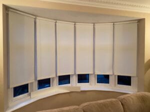 Electric Blinds installed around bay window in West London before Decorquip Capital Fascia also fitted