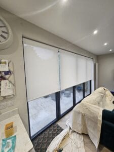 Patio Doors in East London with motorised electric blinds fitted and before Decorquip Capital Fascia